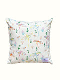 Decorative pillow with colourful floral and dragonfly pattern on a white background