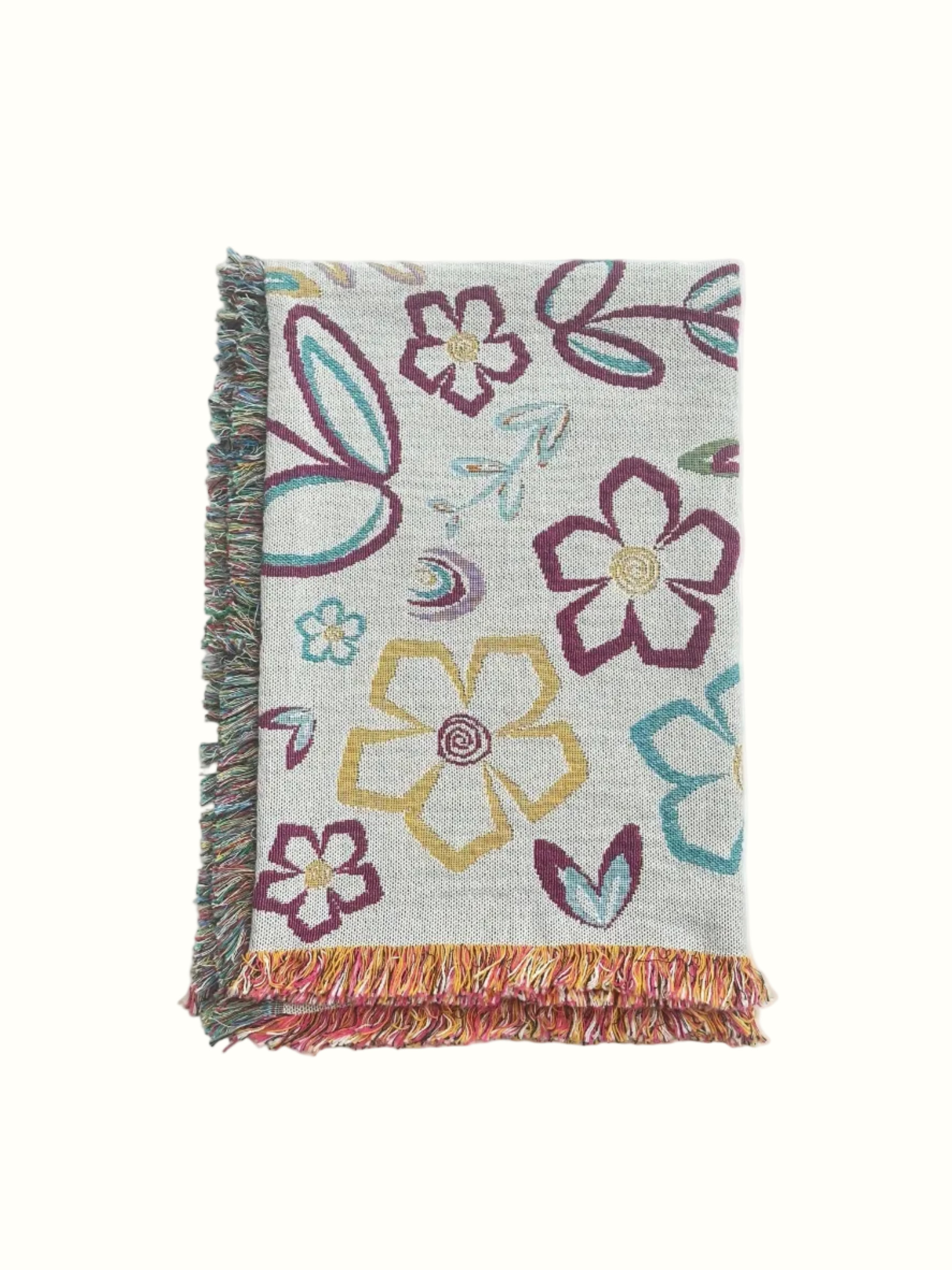 Floral patterned throw blanket with colorful flowers on a white background